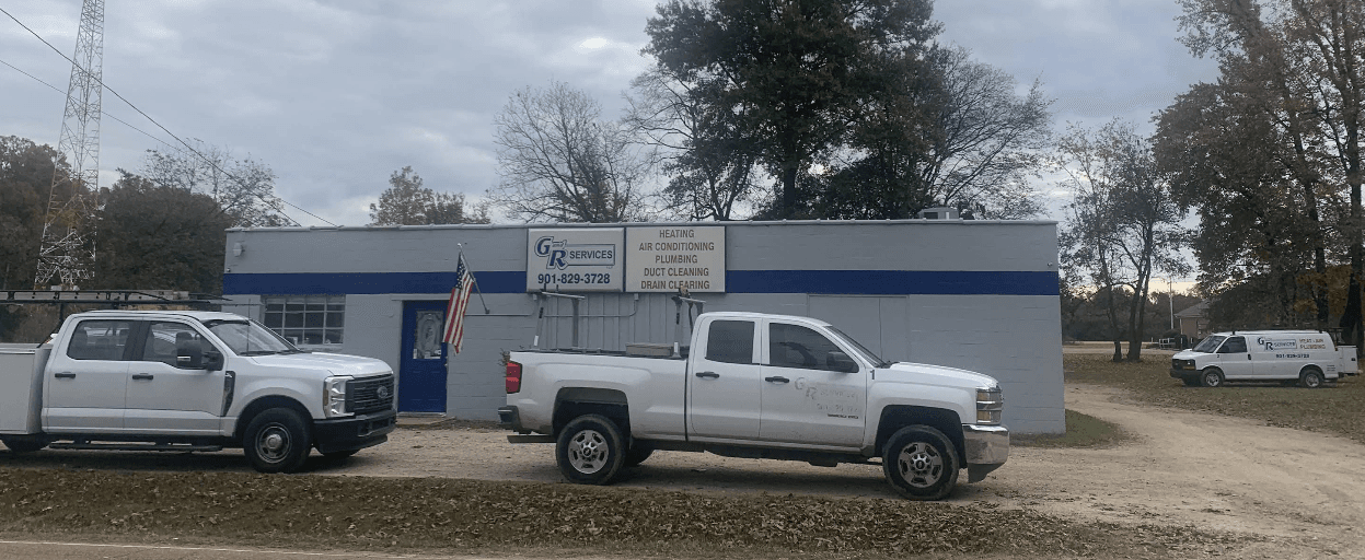 G & R Services building and fleet of trucks